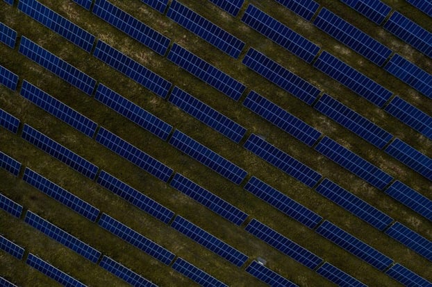 aerial-top-view-of-a-solar-panels-power-plant-AN32P8R-1024x682