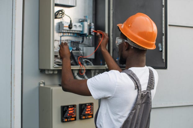 repairman-checking-cables-in-power-transformer-at-2022-04-27-02-13-21-utc-1024x683