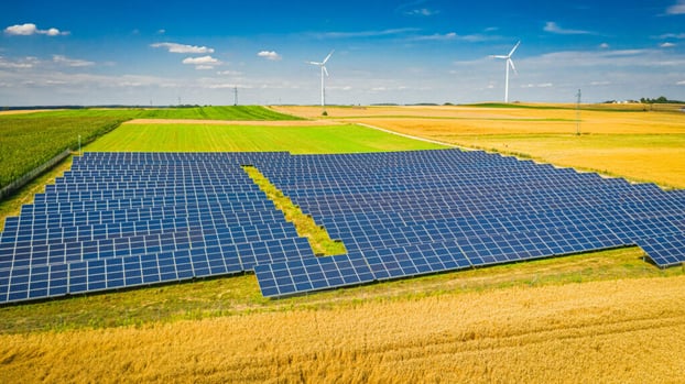 solar-panels-and-wind-turbines-on-field-aerial-vi-2022-04-02-10-14-42-utc-1024x576