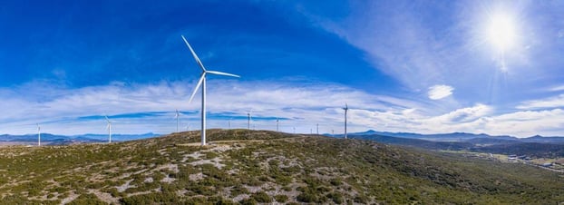 wind-turbines-renewable-energy-on-a-green-hill-w-2021-08-30-20-01-17-utc-1024x373-1