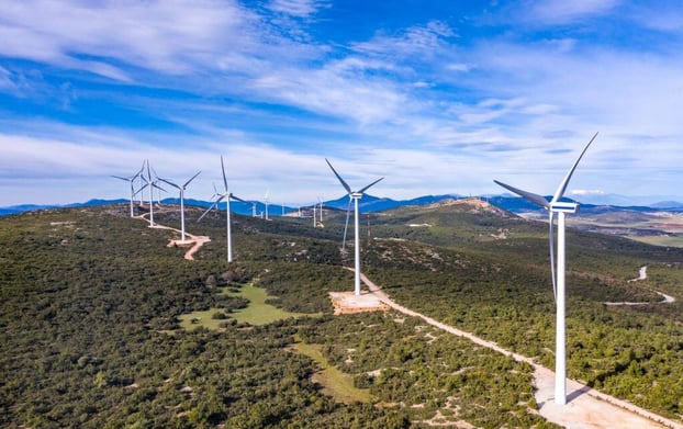 wind-turbines-renewable-energy-on-a-green-hill-win-S4YYJGG-1024x645